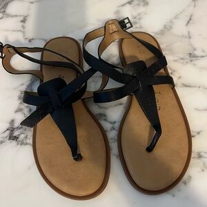 Copper key sandals.